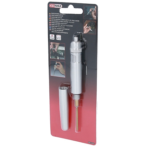 Ein silbernes Präzisionsöl-Werkzeug auf rotem Hintergrund, in einer Verpackung mit Produktinformationen und Anwendungsbeispielen.